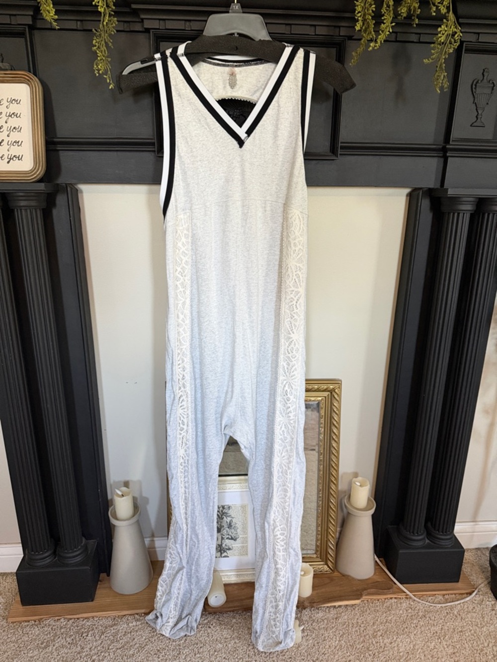 FP Movement by Free People White Sleeveless V-Neck Jumpsuit with Black Trim.